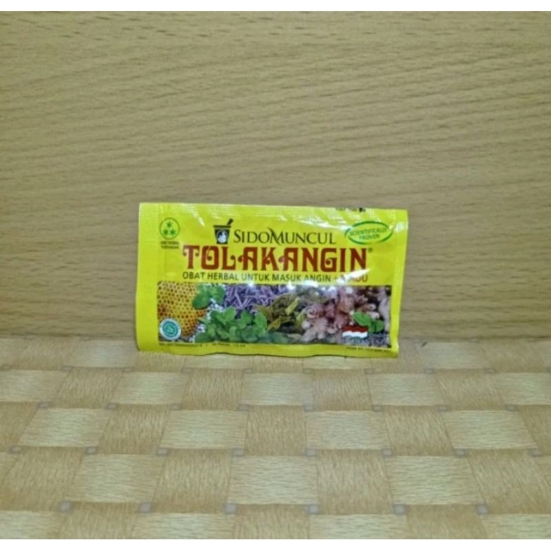 

Tolak angin sidomincul 1bok | (isi 12sach) | herbal untuk masuk angin + madu.