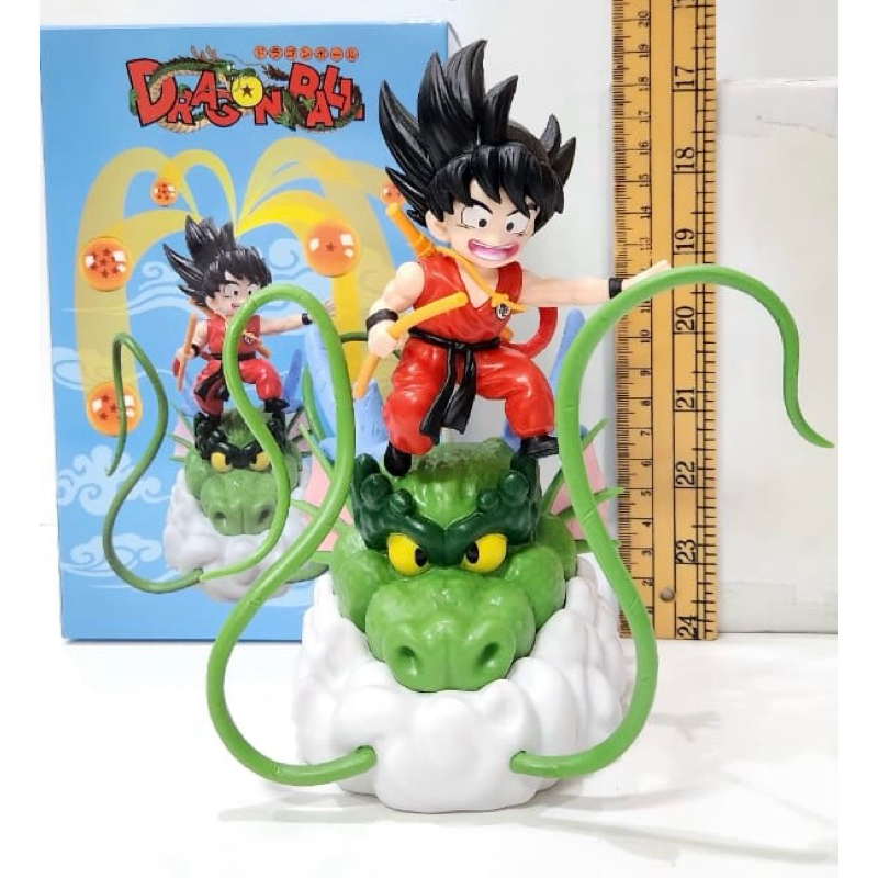 action figure dragon ball goku naik kepala naga hijau