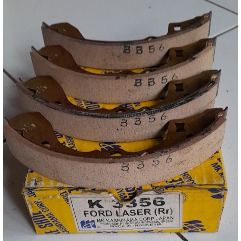 kampas rem belakang ford laser/mazda 323