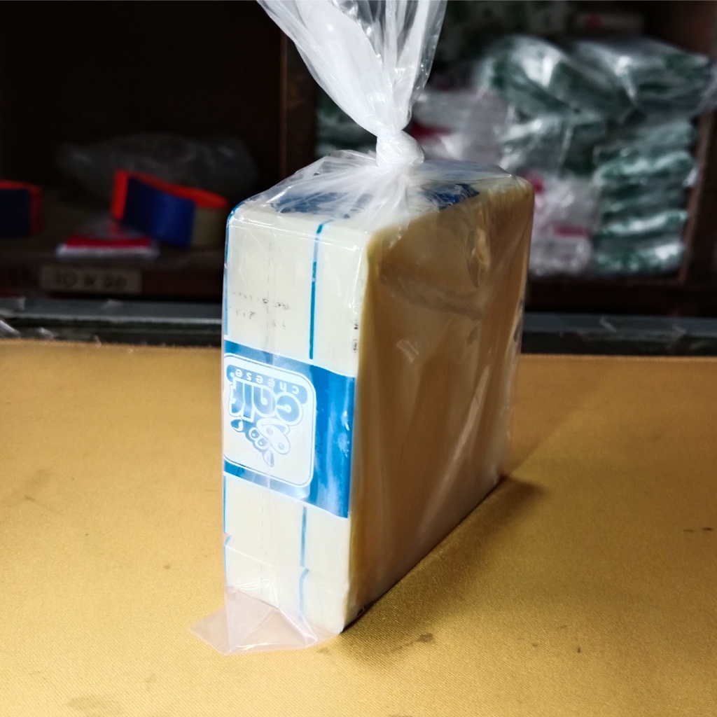 

KEJU CHEDDAR POTONG ECER 250 GRAM CALF MENTARI