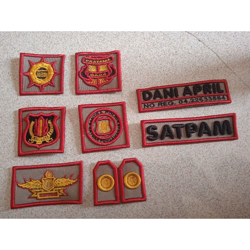 atribut satpam timbul, atribut satpam dasar coklat, atribut satpam monogram kuning, atribut satpam t