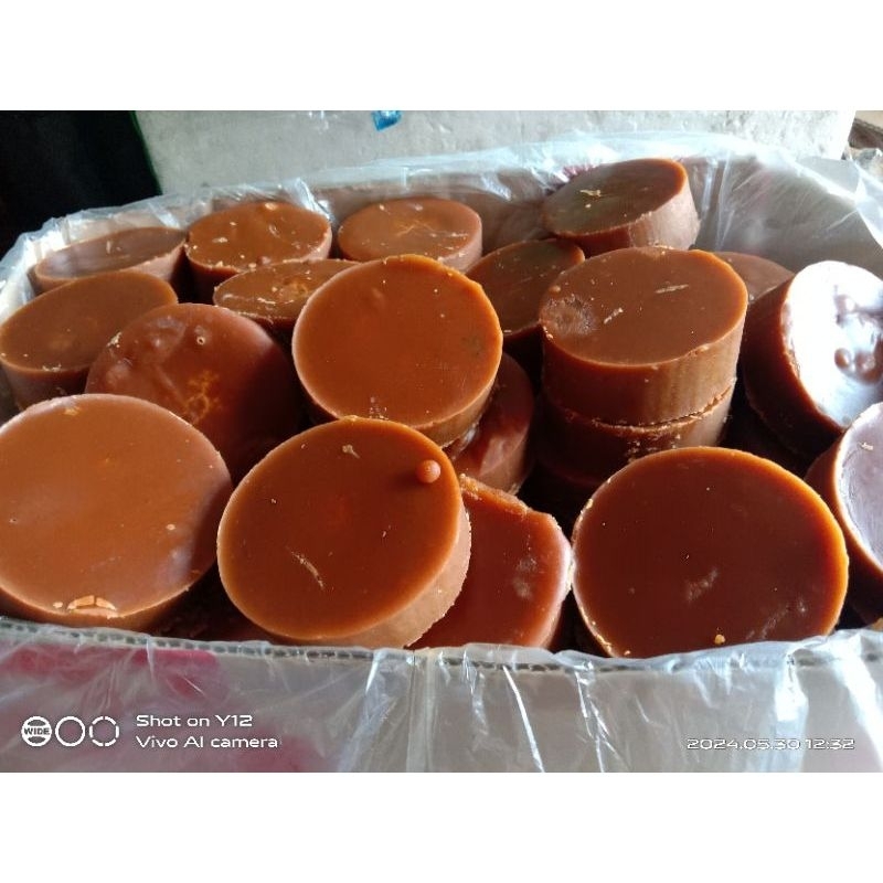 

Gula aren asli merah/gula Kawung bungkus Daun kering kelapa