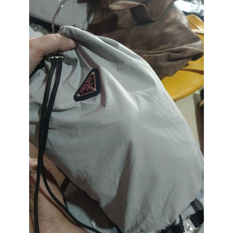 tas bekas tas second prada sling serut