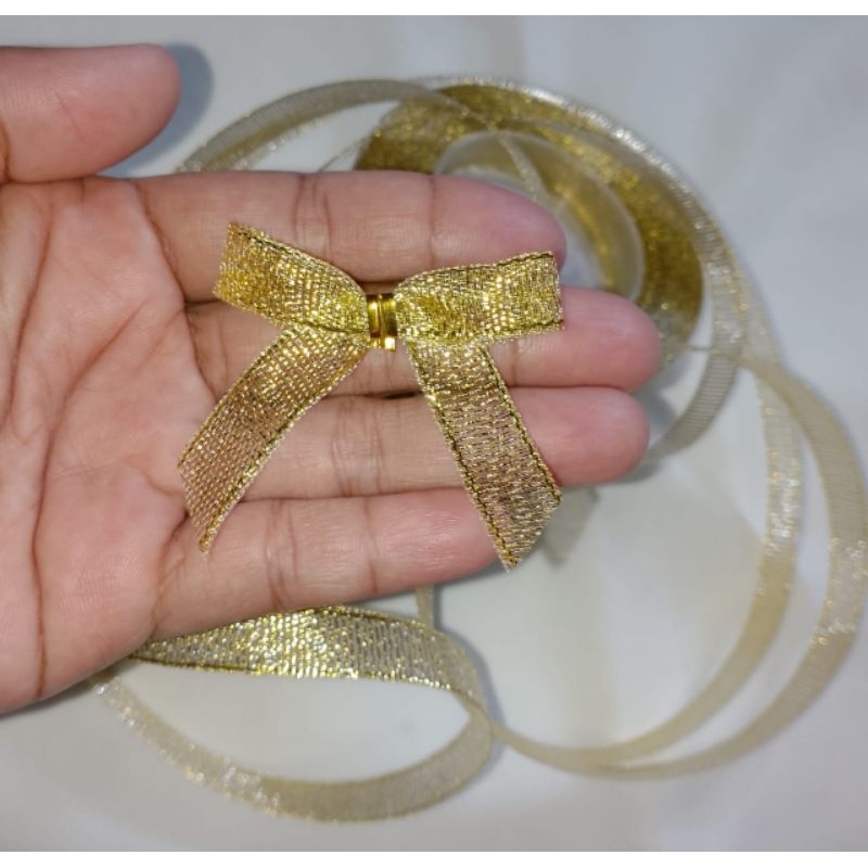 

pita souvenir pita hampers pita tempel pita kado pita Glitter emas & perak ukuran 1 cm pita hias isi 100 pcs