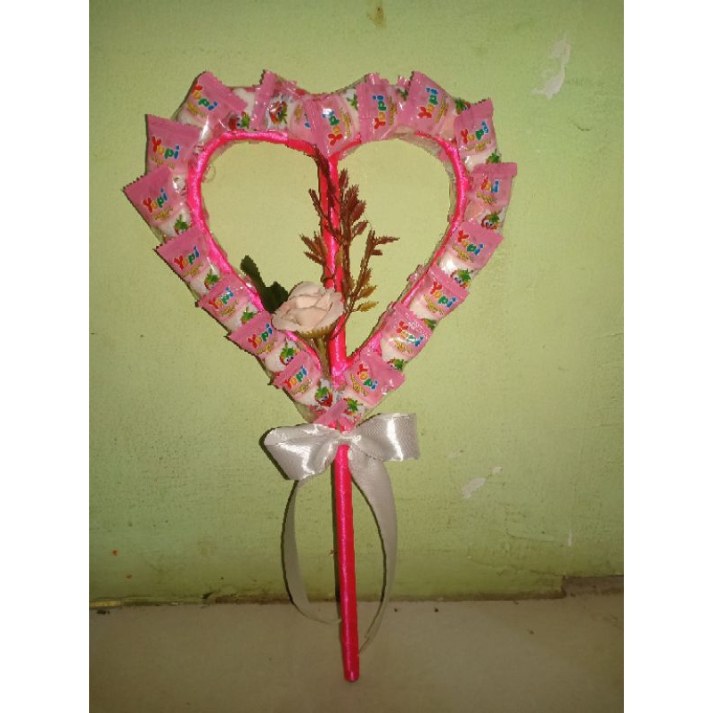 

Permen yupi model love