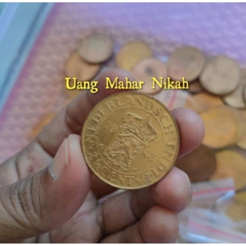 koin benggol 2,5 cent nederlandsch indie . Koin kerokan