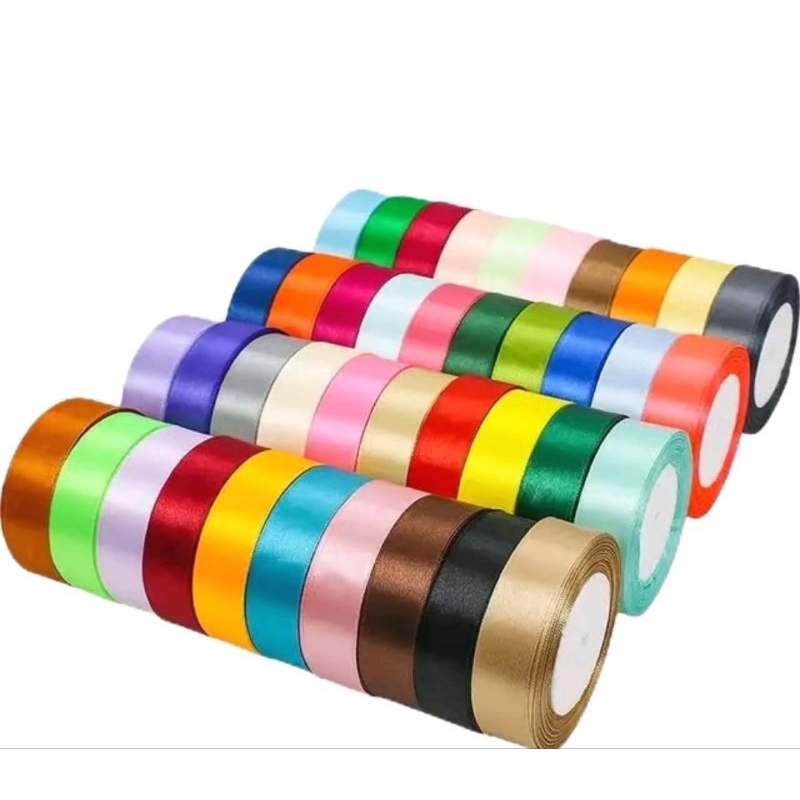

Pita saten ukr 1 inch 2,5 cm panjang 25 yard