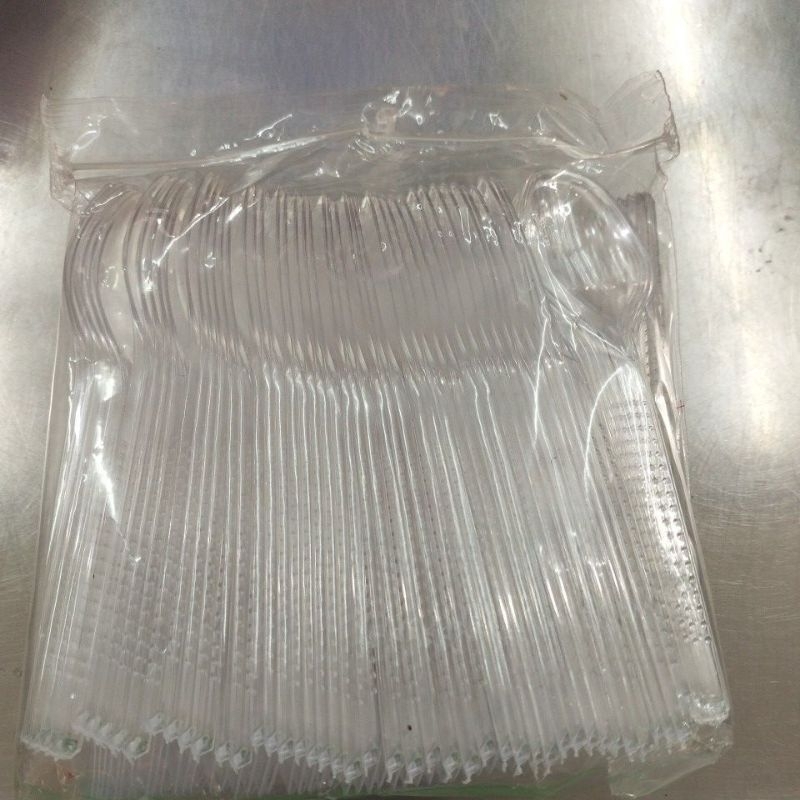 sendok teh plastik bening isi 100