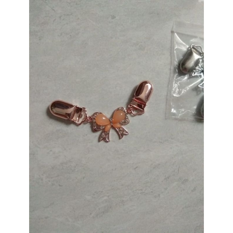 Promo Januari. Jepitan klip cardigan versi ekonomis model pita