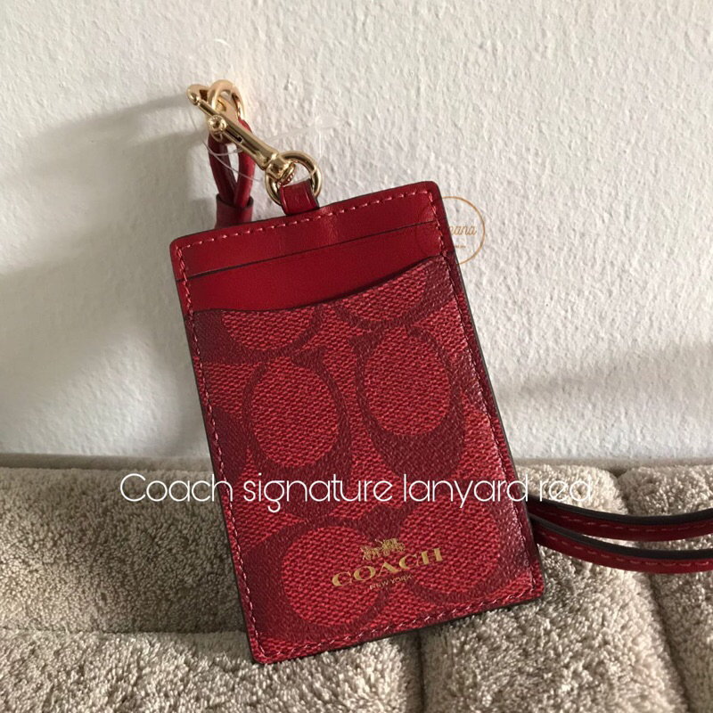 

Coach signature lanyard red