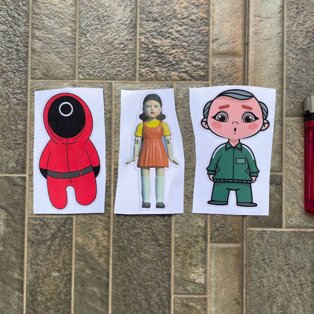 

Stiker Karakter Squid Game Penjaga Merah Boneka Kuning Player Hijau Print Cut