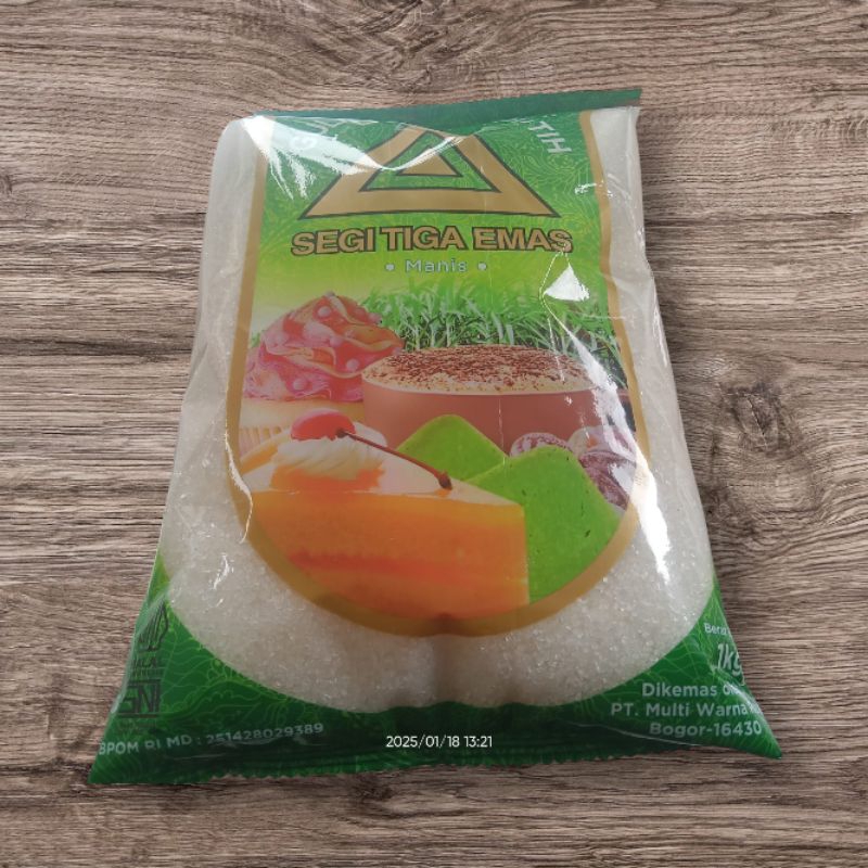 

Gula Pasir Kemasan Cap Segitiga Emas 1 Kg