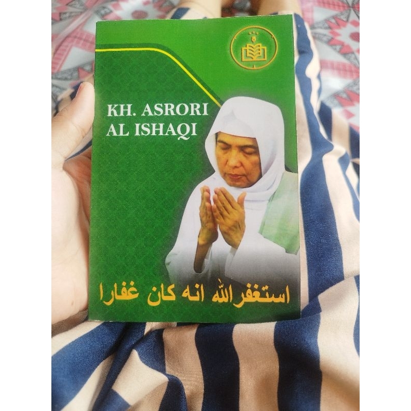 buku manaqib besar al khidmah KH.ASRORI AL ISHAQI