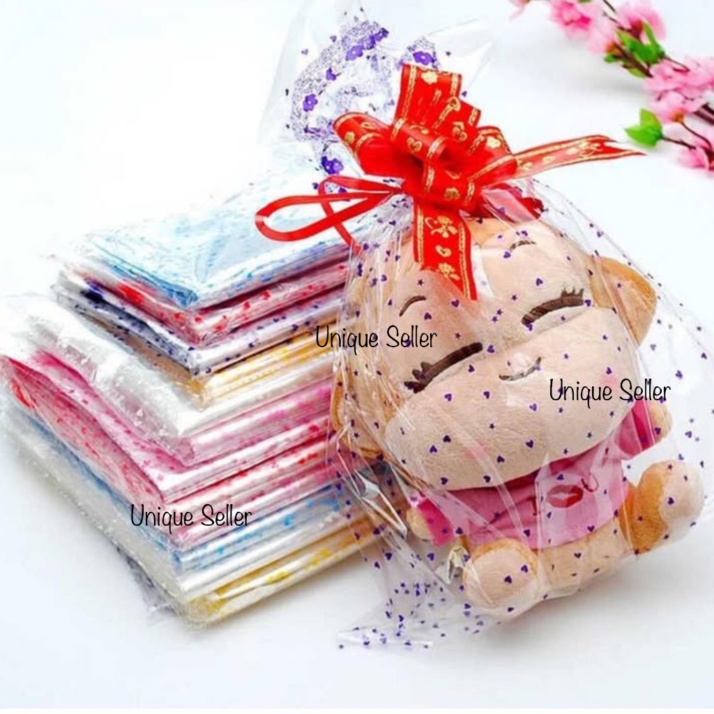

Plastik Kado Kaca Bening MOTIF 64x79 cm isi 50 Lembar / Plastik Parcel Bening Motif Lembaran / Kertas Kado Kaca MOTIF