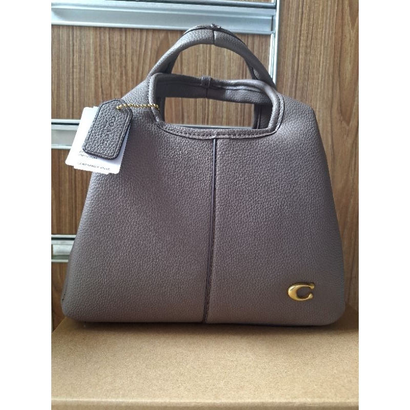 - SOLD- Coach Lana size 23 - Khaki