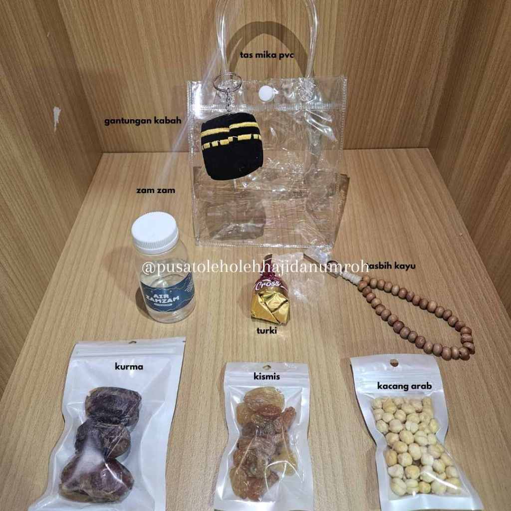 

Paket oleh oleh Haji Dan Umroh Eksklusif Tas Goodie Bag Totebag Transparan Coklat Turki Tasbih series Gantungan Kunci Unta dan Kabah