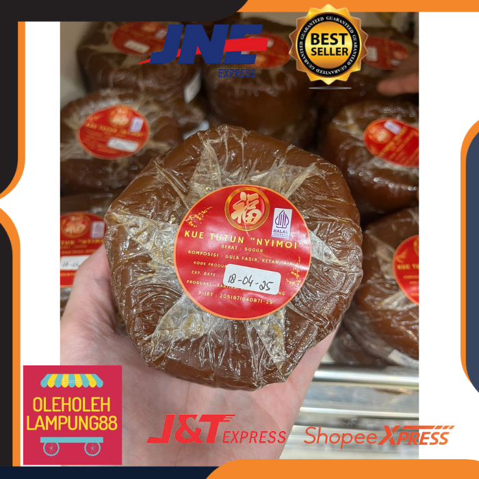 

Nyimoi Kue Tutun Kemasan 500Gr Kue Tradisional Acara Penting Kue Tutun Tradisional Nyimoi Lampung