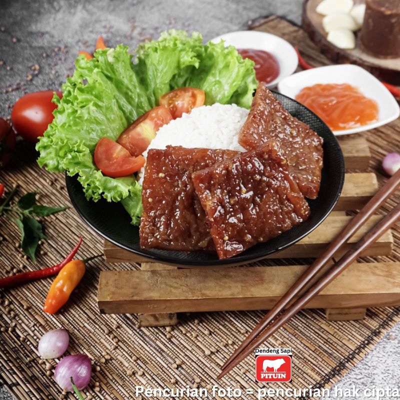 

Dendeng daging sapi 500g + dendeng jando sapi 500g Premium (bersertifikat Halal) rasa original, enak, nikmat & bergizi tinggi.