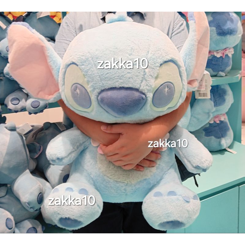 Miniso Boneka Stitch Duduk Ukuran Besar 55cm Sitting Stitch with Flower Necklace Plush Toy