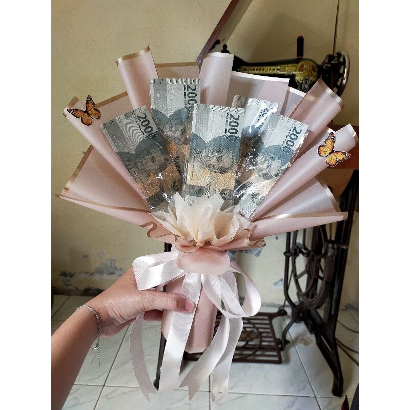 

Buket uang / buket money / buket uang 2 ribuan