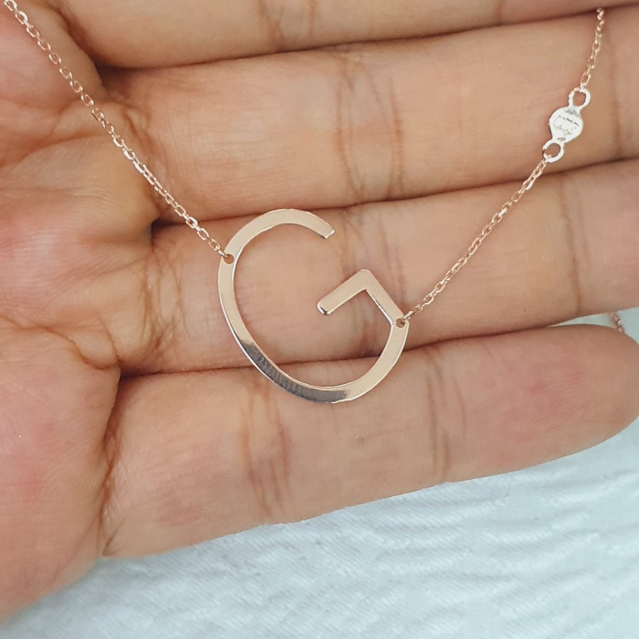 kalung siem variasi huruf G variasi rose emas 75% 750 75 % 17k