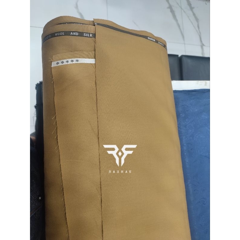 Kain Khaki Pemda semi wool import premium De'Boss
