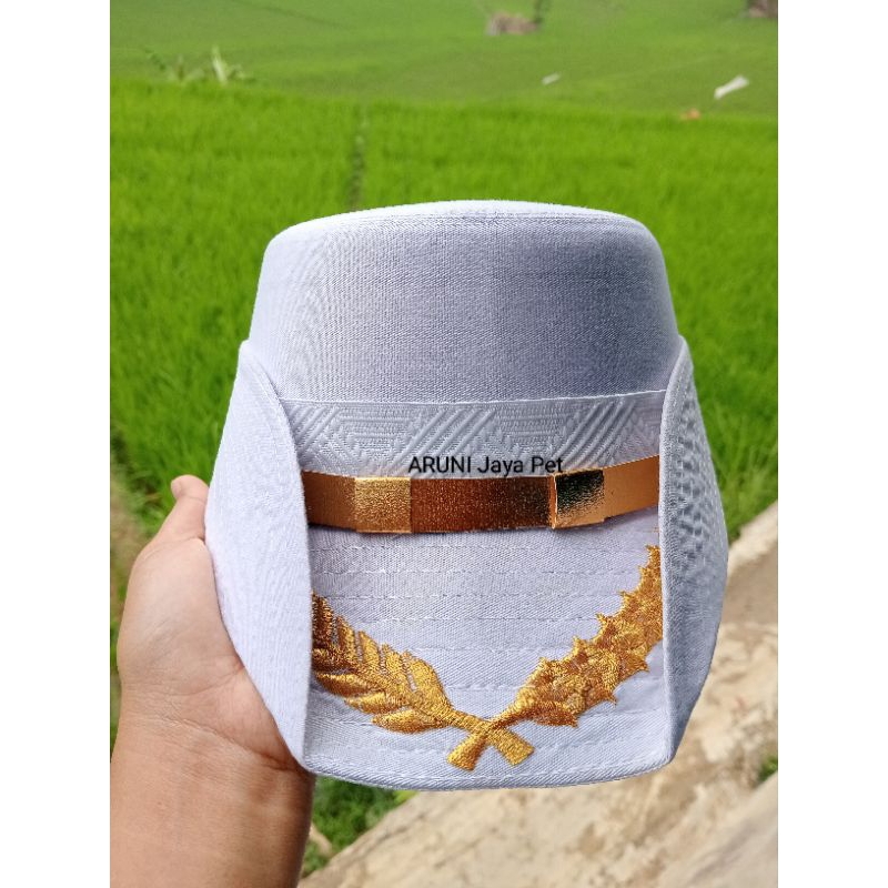 topi kowad