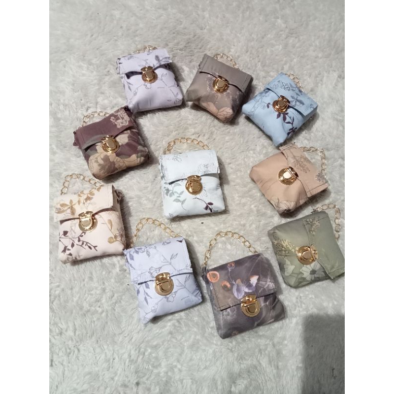 mukena travel motif parasut
