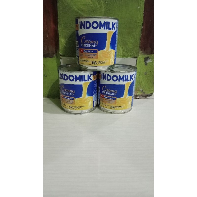 

Indomilk kaleng putih paket 2 pcs