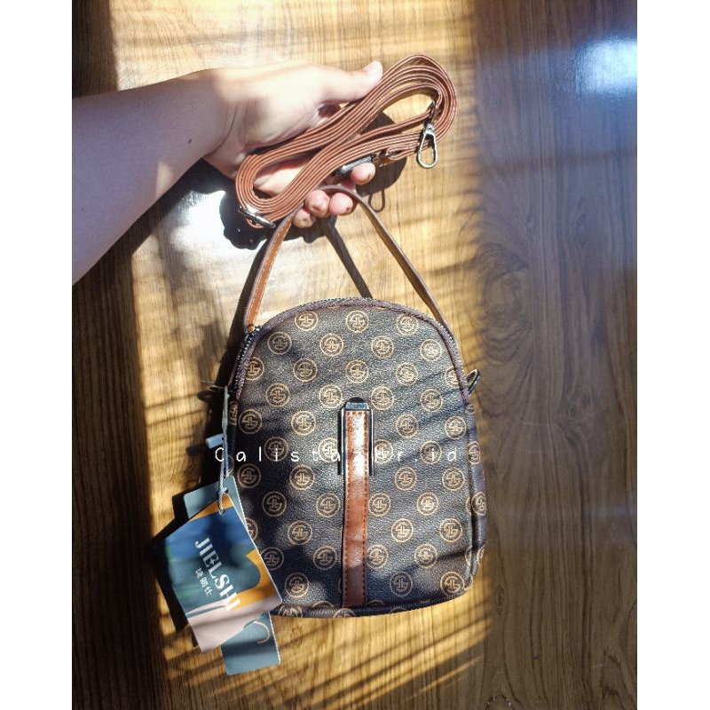 VATIKA TAS HP JIELSHI