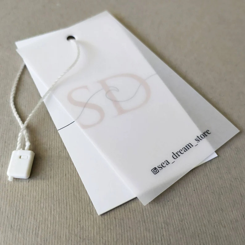 

HANGTAG HANG TAG LABEL BAJU CUSTOM FASHION TRANSPARAN