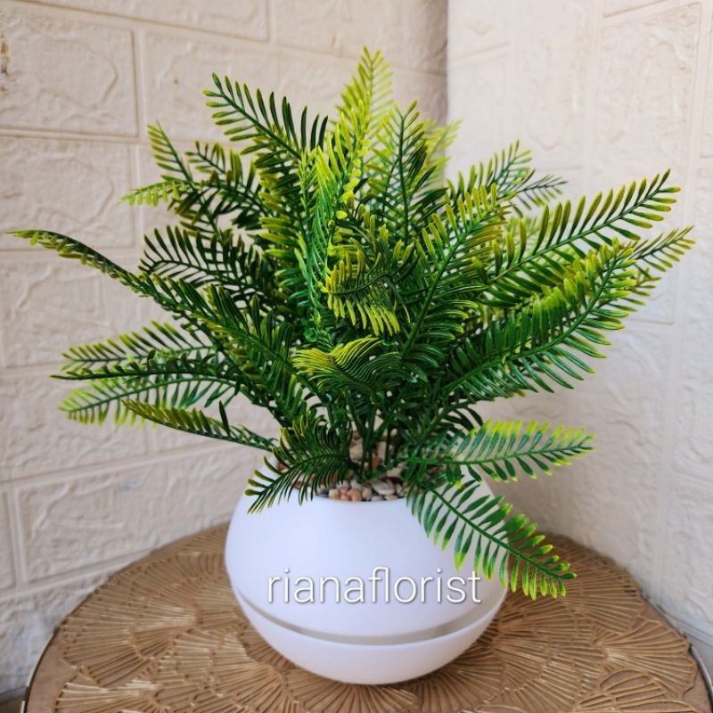 DAUN HIAS VAS BULAT ARTIFICIAL