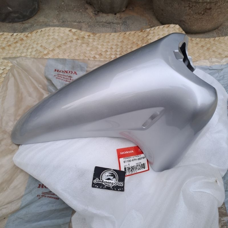SLEBOR SPAKBOR DEPAN HONDA KARISMA 125 SILVER ORIGINAL AHM