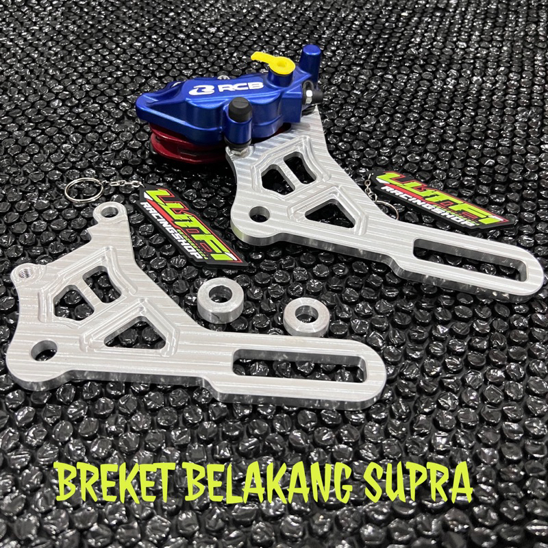 BREKET KALIPER RCB 2P BELAKANG HONDA SUPRA X125DD BAHAN ALUMINIUM FULL CNC