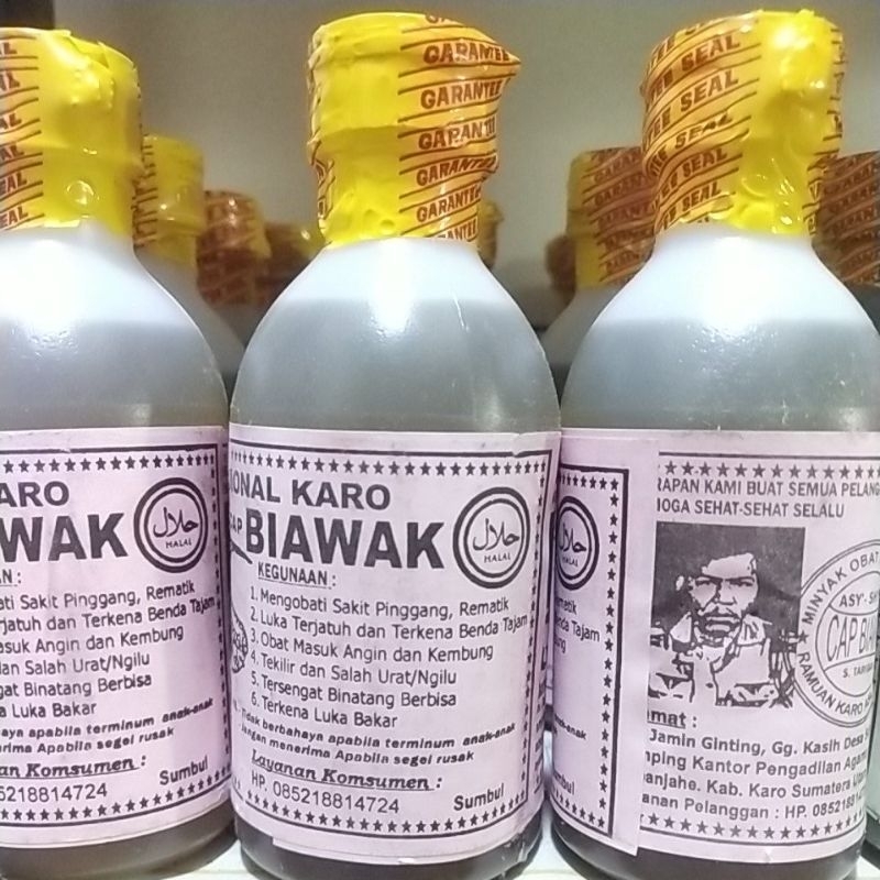 Minyak Urut Karo cap Biawak