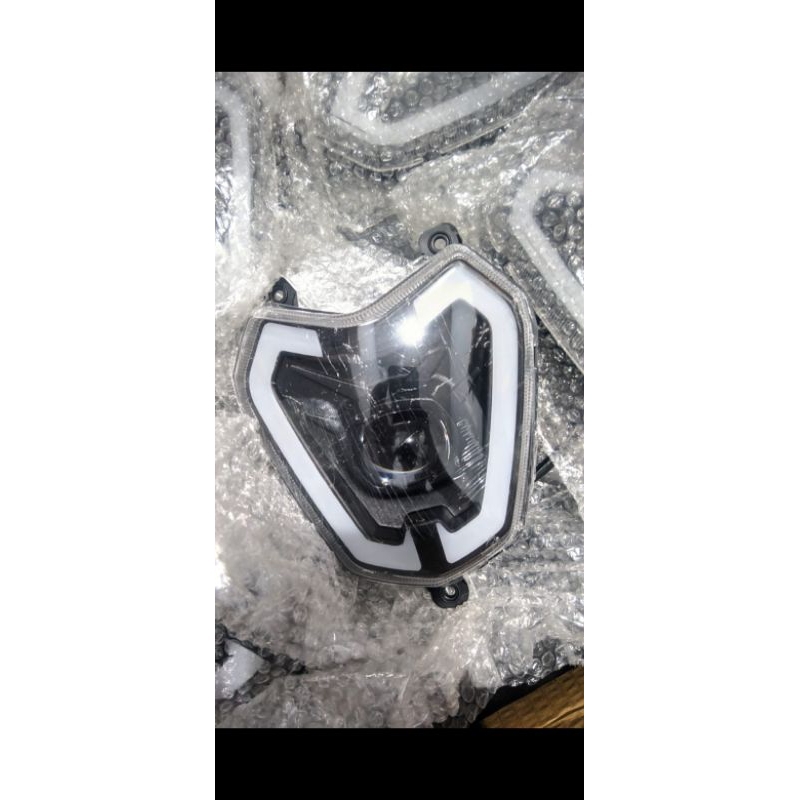 Original Lampu depan sepeda listrik merk goda seperti di foto.