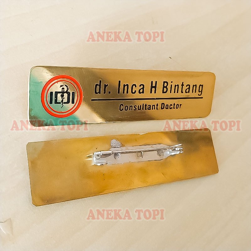 

Name Tag Logo IDI Bahan Logam Nama Dada Stall IDI Full Logam - Aneka Topi