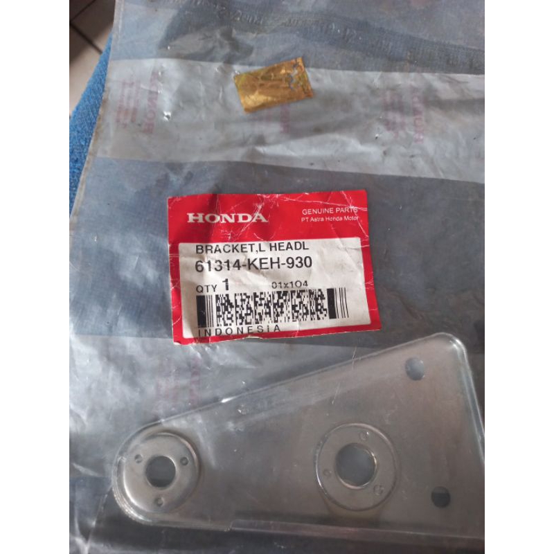 BRACKET, L HEADL 61314-KEH-930