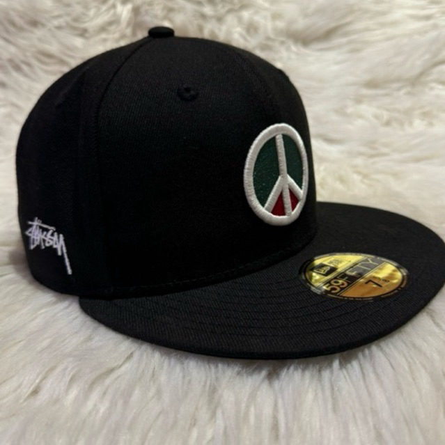 Topi New Era X Stussy Peace