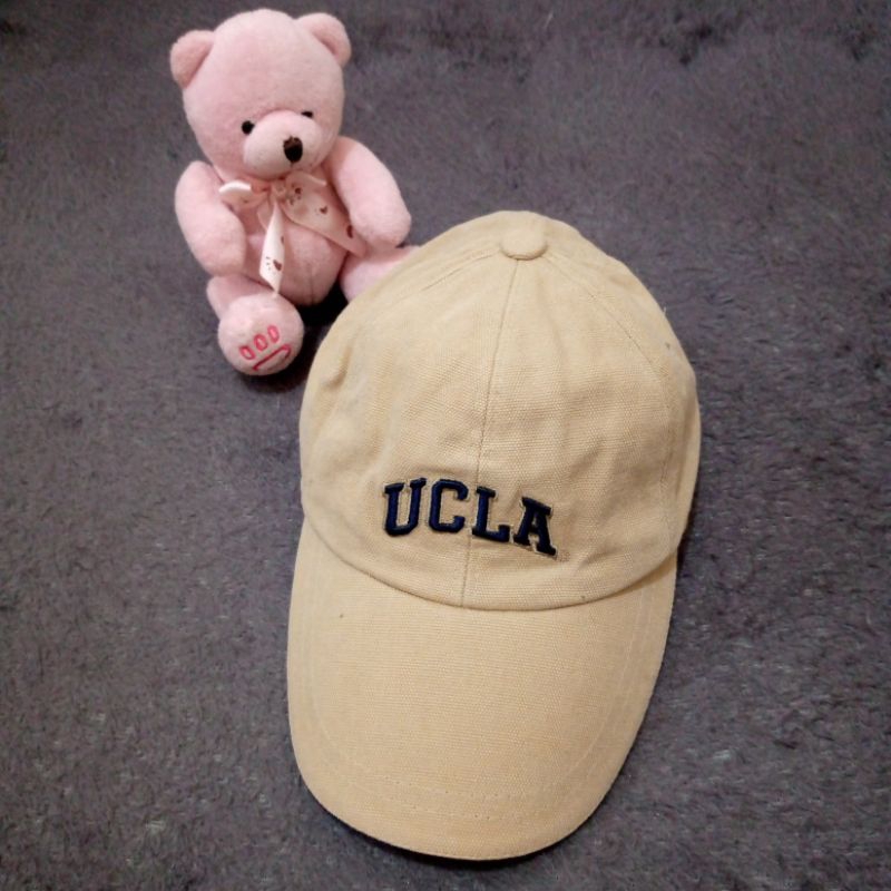 topi simple cap ucla tag ucla warna cream