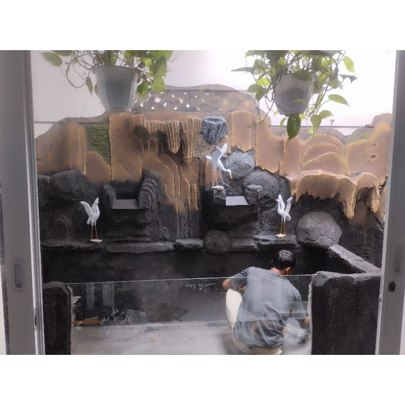 Relief kolam ikan koi kaca