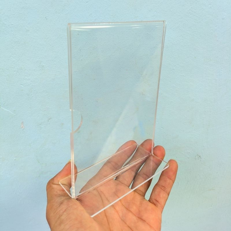 

AKRILIK TEMPAT BROSUR / TEMPAT QRIS /TEMPAT MENU /TENT CARD UKURAN A6