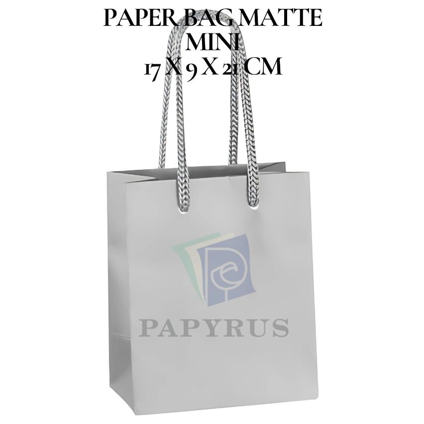 

PAPER BAG POLOS / HAMPERS BAG / GOODIE BAG / SOUVENIR BAG / TAS KADO POLOS / GIFT BAG / PAPER BAG MATTE DOFF MINI SILVER 17 CM X 9 CM X 21 CM