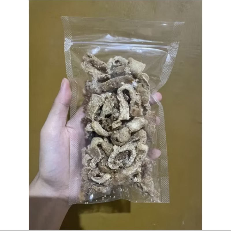 

Minyak babi goreng / Bak iu phok/ Kerupuk babi / Kerupuk babi garing fresh premium