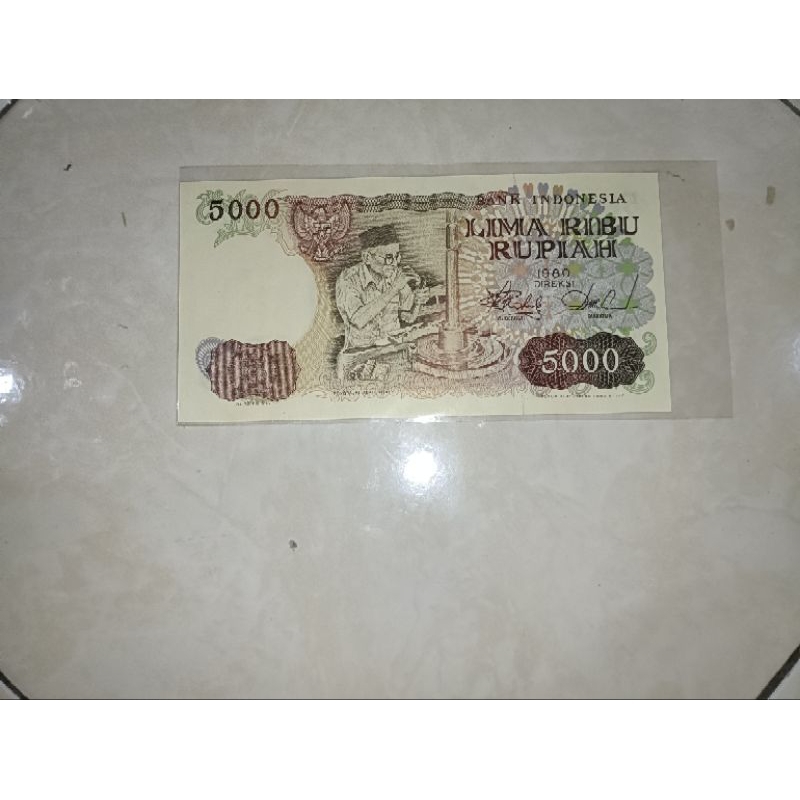 uang 5000 / lima ribu rupiah pengasah intan tahun 1980 asli unc