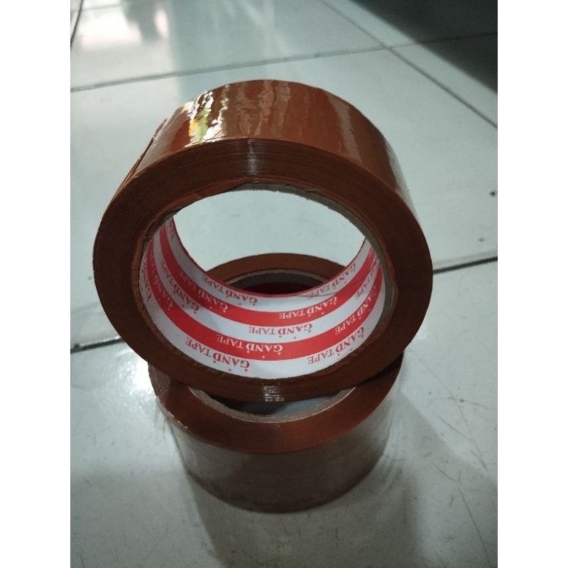 

Lakban coklat 2 inchi Gand 1 slop isi 6