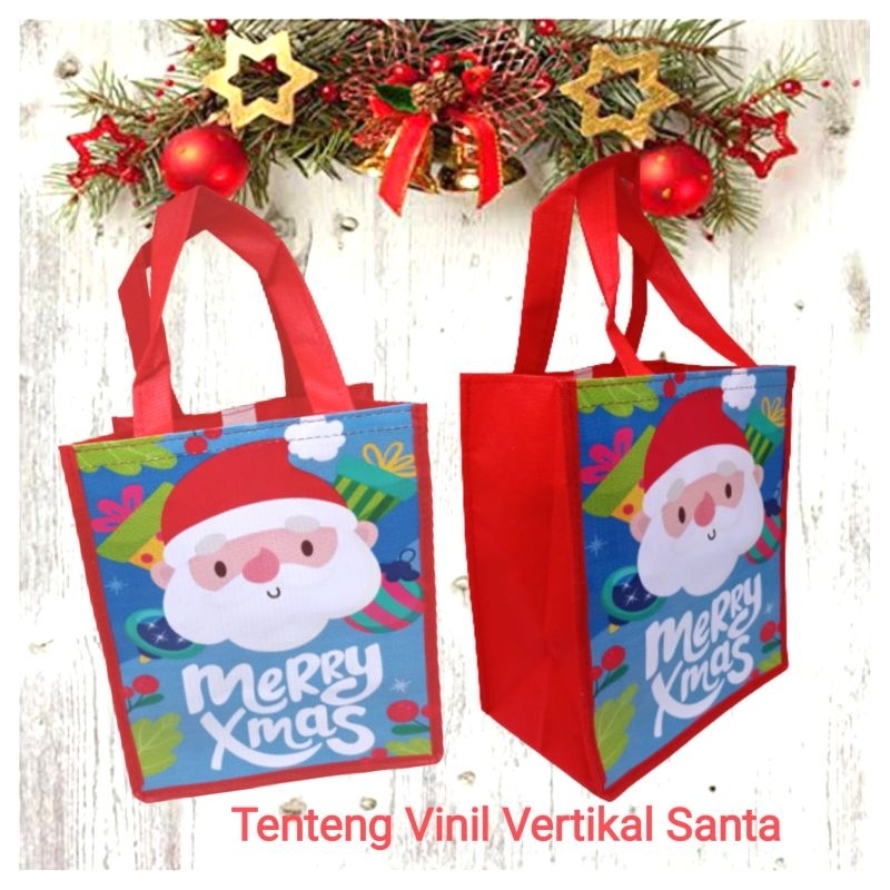 

Tas Natal Tenteng Vinil Vertikal size 20x13x24 cm Goodiebag Natal murah