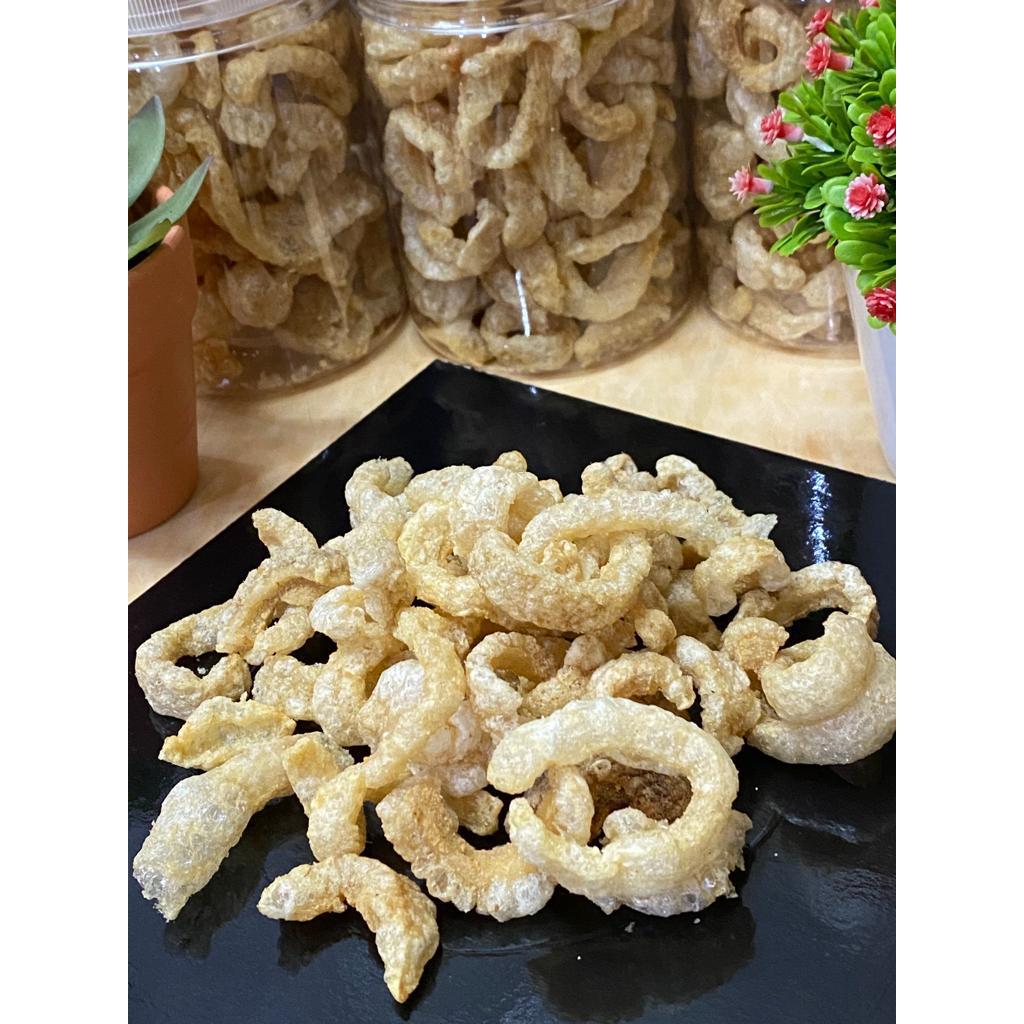 

Kerupuk Babi Kulit Kerubi Rambak Kecil