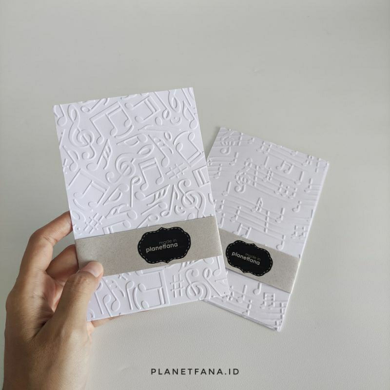 

planetfana • Kertas emboss motif musik