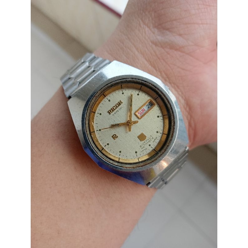 jam ricoh automatic original pria